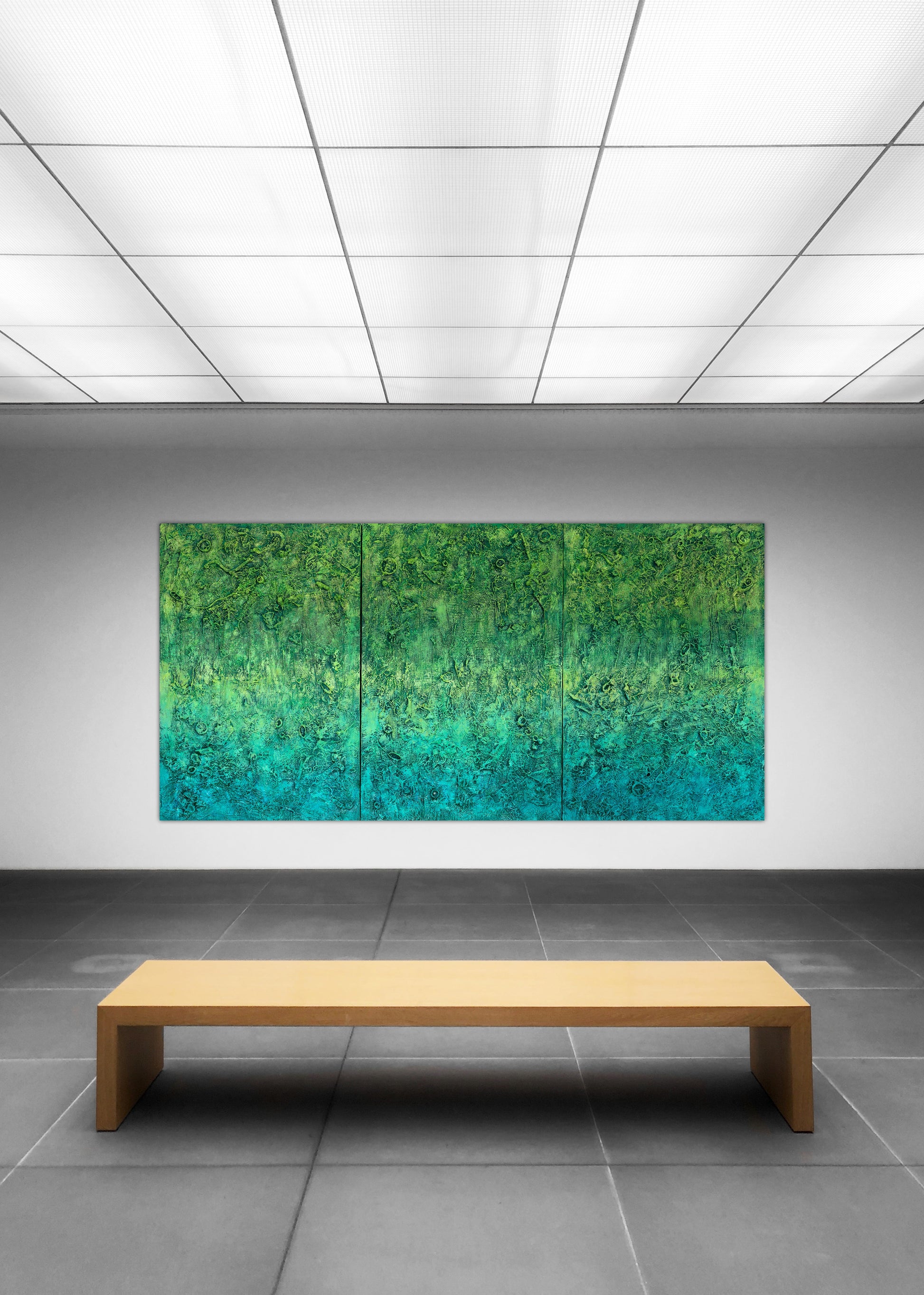 The Grounding’ abstract art by Pamela Rys showcased in a gallery, capturing the essence of grounding and pranic healing through dynamic green gradients.